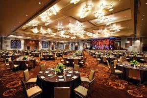a large banquet hall with tables and chairs at ARIA Resort & Casino in Las Vegas +93 photos