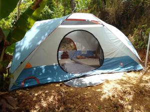 a tent that is sitting in the dirt at Pine Ridge 4-Person Tent in Pleasing Prospect