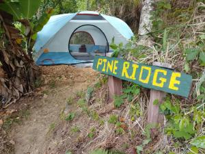 a sign that reads fire ridge next to a tent at Pine Ridge 4-Person Tent in Pleasing Prospect