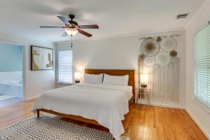 a bedroom with a bed and a ceiling fan at Heated Pool, 6 Acres: Beacon Area Vacation Rental in Lagrangeville +34 photos