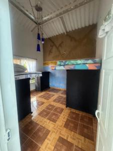 an empty room with a room with a ceiling with a room at Finca los carrangueros in Apulo +6 photos