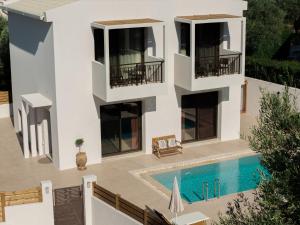 an image of a villa with a swimming pool at AnaRose Zante Villa-by Sakis and Sam in Planos