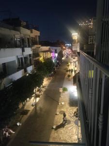 an overhead view of a street at night at A Night at Zona colonial in Santo Domingo +2 photos