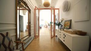 a hallway with a large mirror in a room at La Dolce Sosta in Venice