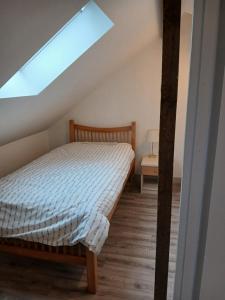 a bedroom with a bed in a attic at Roshinehill apartment in Shanbally