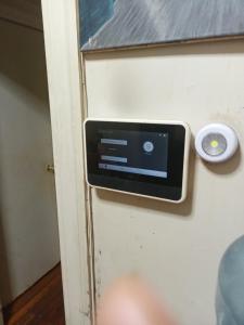 a door with a speaker on the wall at Anderson home services in Woodlawn