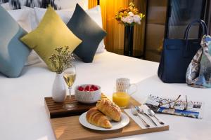 Možnosti snídaně pro hosty v ubytování Drawing Hotel