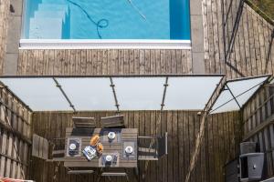 a table with speakers on it in front of a building at residence kersailliou in Roscoff