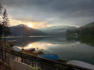 a view of a lake with boats on the shore at Setteacque Lakeview Rooms in Piediluco +11 photos