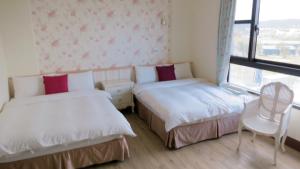 Letto o letti in una camera di Xiang Xiang