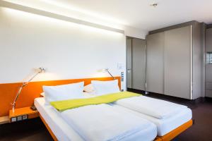 Hotel Windschur客房内的一张或多张床位