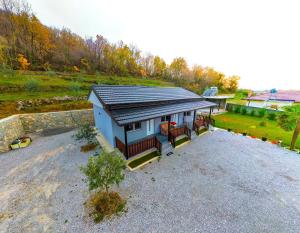 an overhead view of a small house in a field at Bujtina4A Rrenc in Renc
