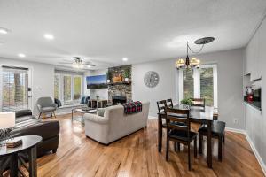 a living room with a couch and a table at Hiking Trails King Bed View Recently Renovated in Sugar Mountain