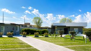 a house with a garden in front of it at Brahma luxury B&B in Marigliano +24 photos
