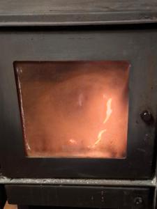 a stove top with austedusted out area in an oven at casa completa Balmaceda 77 in Concepción