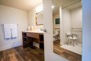 a bathroom with a sink and a toilet at Manzanita Oceanfront Inn in Manzanita +64 photos