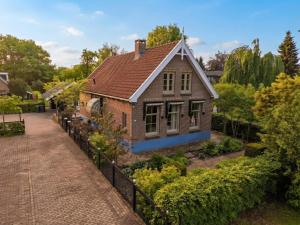a model of a house with a garden at De Muldershof in Vriezenveen