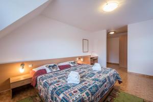 Llit o llits en una habitació de Penzion Eso
