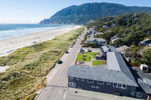 an aerial view of a house and the beach at Manzanita Oceanfront Inn in Manzanita