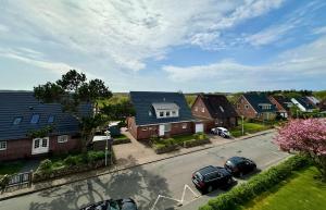 an aerial view of a residential neighborhood with houses at Appartement-152 in Westerland +1 photo