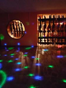 a room with green and blue lights on the floor at KORONA Sanatorium Uzdrowiskowe in Muszyna +33 photos