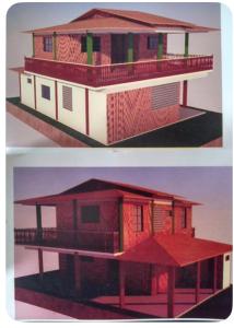 a model of a house with a red roof at Wana Soeiro in Marapanim