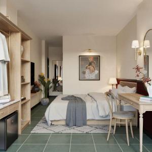 a bedroom with a bed and a table and a desk at LoverA Signature Hotel in Ho Chi Minh City +50 photos