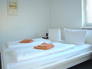 Voodi või voodid majutusasutuse Rooms & Apartments near Zoologischer Garten toas