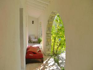Postel nebo postele na pokoji v ubytování L'Ostal du Pic St Loup