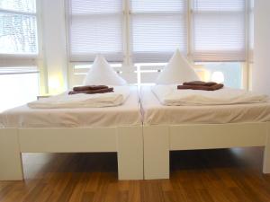 Voodi või voodid majutusasutuse Rooms & Apartments near Zoologischer Garten toas