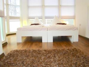 Voodi või voodid majutusasutuse Rooms & Apartments near Zoologischer Garten toas