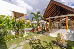 an image of a villa with a garden at SUMA Bali in Uluwatu