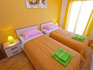 Postel nebo postele na pokoji v ubytování Apartment Cocaletto 1047