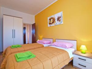 Postel nebo postele na pokoji v ubytování Apartment Cocaletto 1047