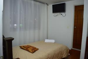 Postel nebo postele na pokoji v ubytování Hotel Dancar