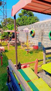 a playground with a table and a volley ball at Quantico Guest house villa in Ndola