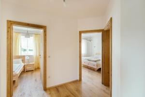 Łóżko lub łóżka w pokoju w obiekcie Ferienwohnung Mayrhofer