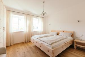 Łóżko lub łóżka w pokoju w obiekcie Ferienwohnung Mayrhofer