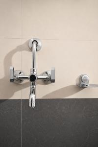 a bathroom sink with a faucet at Vilasa Prime Hotel in Guwahati +28 photos