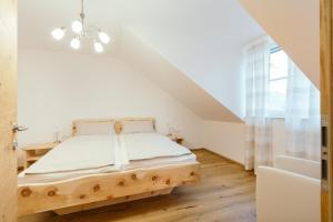 Łóżko lub łóżka w pokoju w obiekcie Ferienwohnung Mayrhofer