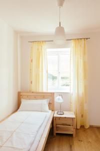 Łóżko lub łóżka w pokoju w obiekcie Ferienwohnung Mayrhofer
