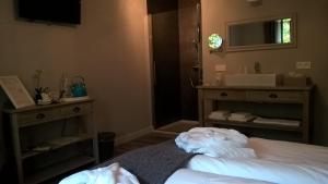 Postel nebo postele na pokoji v ubytování B&B Rosteline