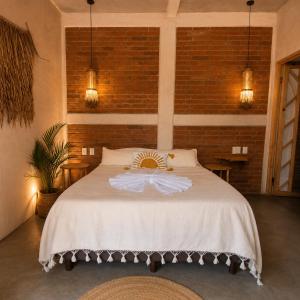 Llit o llits en una habitació de Amixtli
