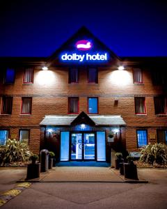 a hotel with a sign on the front of it at The Dolby Hotel Liverpool - Free city centre parking in Liverpool