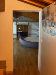 a bedroom with a large bed in a room at Casa la Mirage 6 in Bozzolo