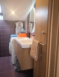 a bathroom with a sink and a mirror at Casa Evita in Sanxenxo +13 photos