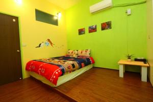 Voodi või voodid majutusasutuse Time Travelodge Homestay toas