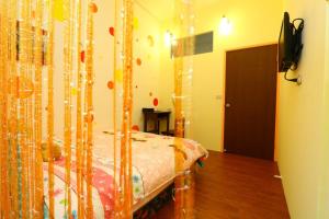Voodi või voodid majutusasutuse Time Travelodge Homestay toas