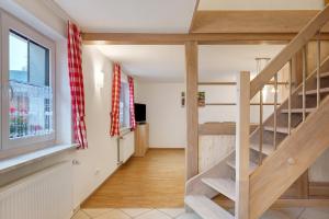 a staircase leading to the second floor of a house at Süßen Häusle in Breitnau