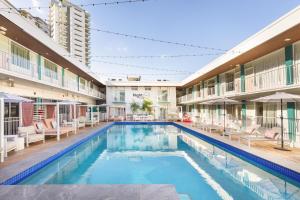 an image of a swimming pool in a hotel at Nightcap at the Cavenagh in Darwin